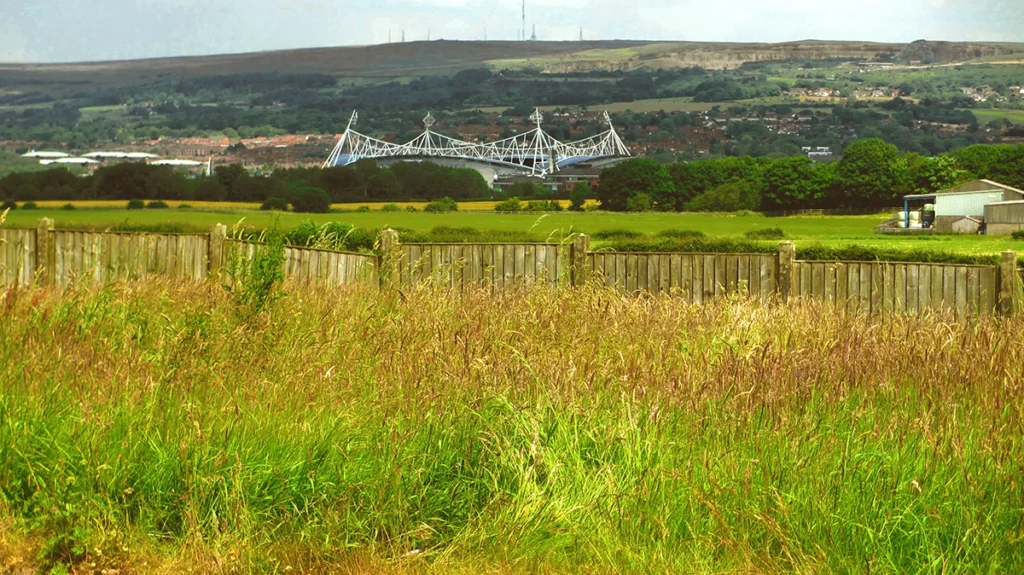 Stunning view of Rivington pike strimming overgrown large garden